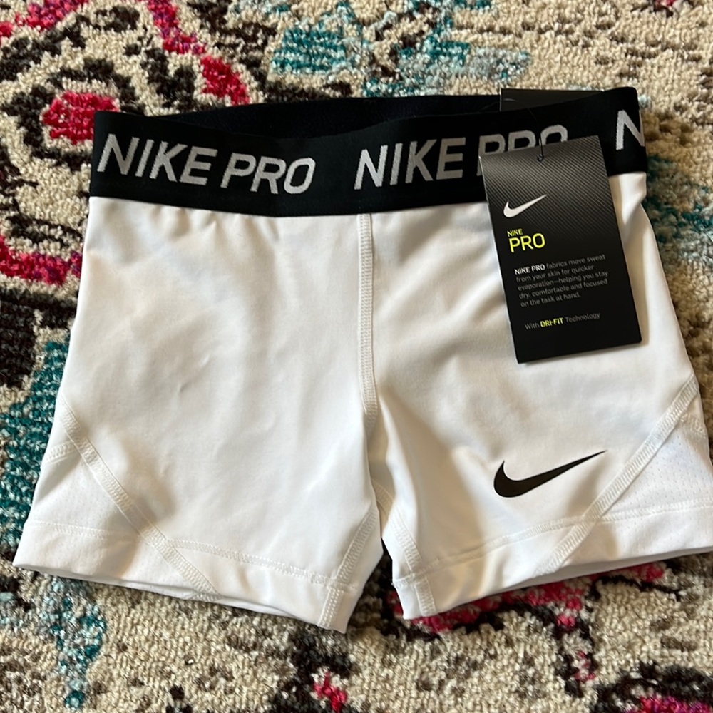 White Nike pros extra small